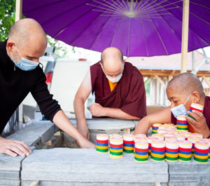 Filling the last two stone stupas